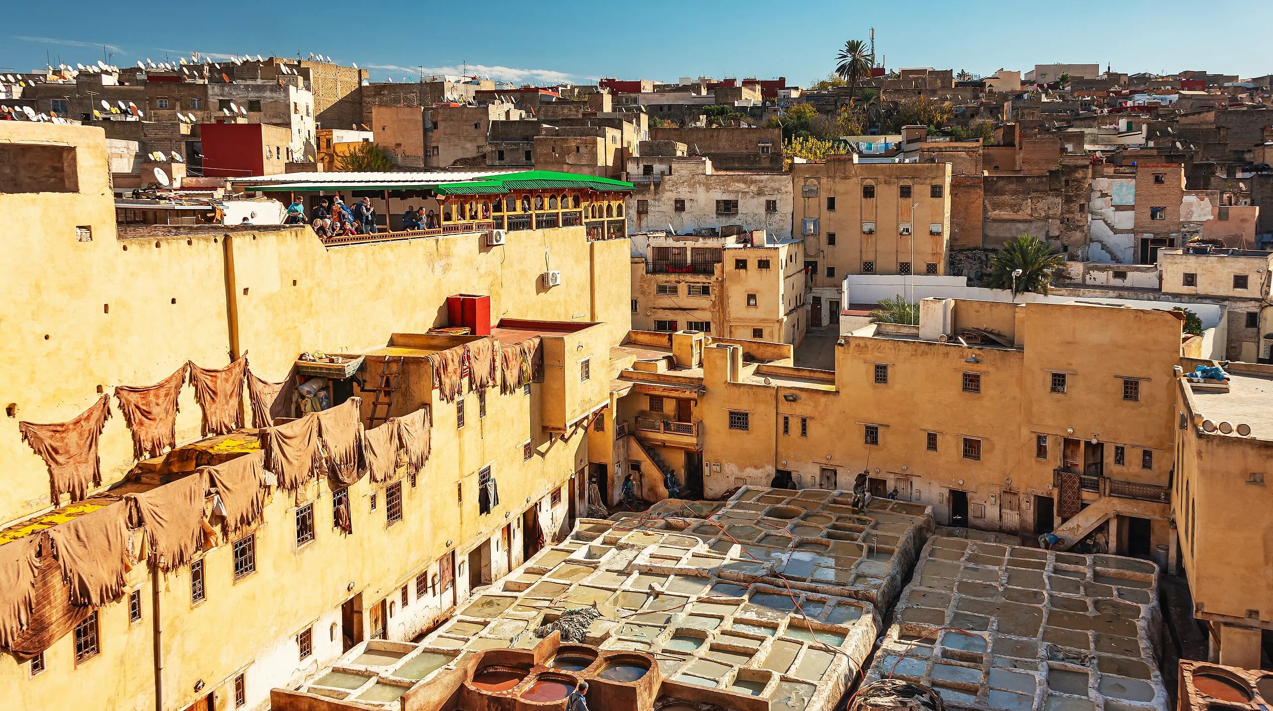 The dye pits of the Chouara tannery in Fes, seen from the surrounding rooftops